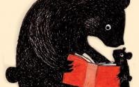 illustration ours noir qui lit à son petit